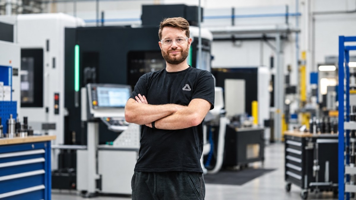 Factory floor showing CNC machines running manufacturing automation software