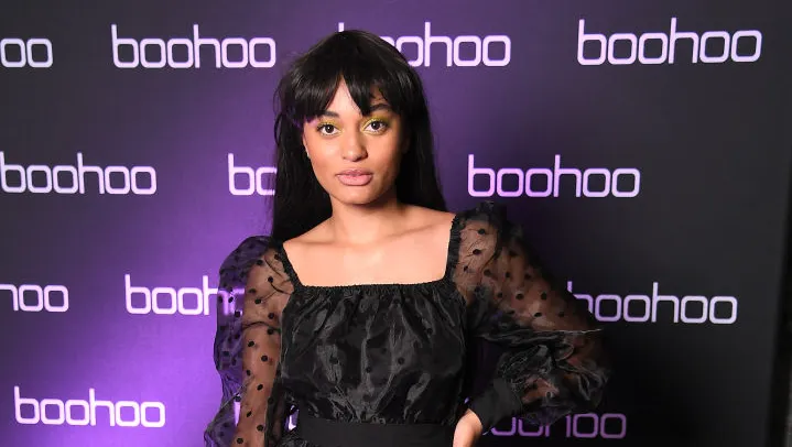 Shopping bags representing brands traded in the brand licensing marketplace after Nasty Gal acquisition