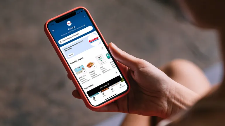 Delivery driver handing off a package as part of nationwide delivery marketplaces expansion